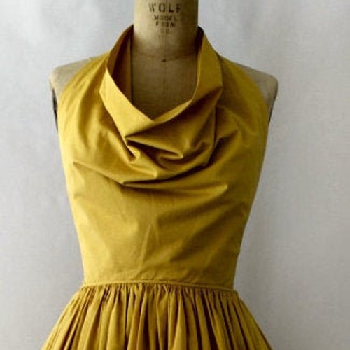 1950's halter draped neck Clair McCardell sunny dress sewing pattern. Very flattering circle skirt.