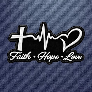 May include: A black embroidered patch featuring a white stitched design of a Christian cross transitioning into a heartbeat line and a heart shape. Below the graphic, the text Faith • Hope • Love is embroidered in a white cursive font.