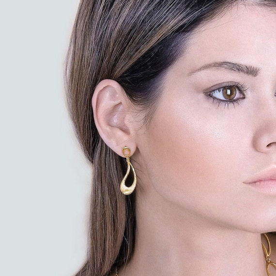 Delicate Gold stud earring, also available in Silver