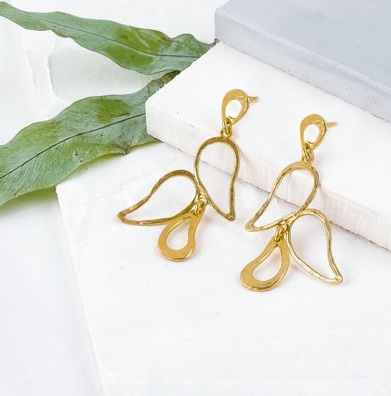 Golden dangle stud earrings with Paisley motif, also available in Silver