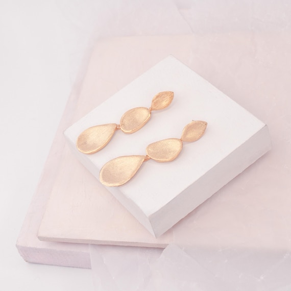 Long Gold cascading stud earrings, also available in Silver