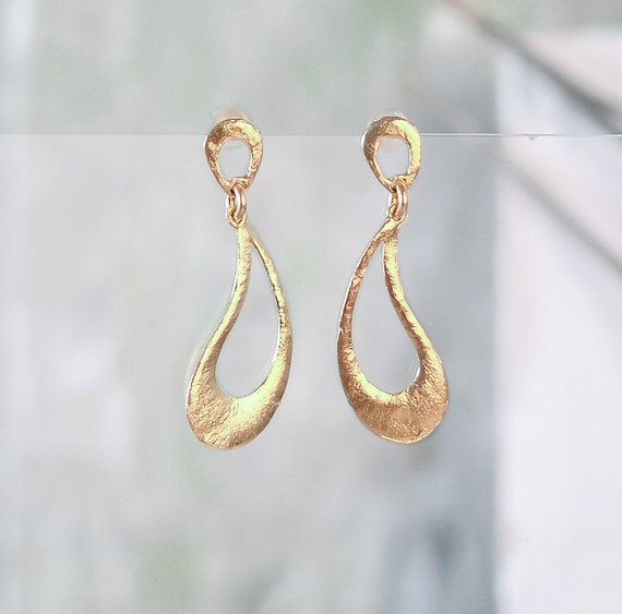 Delicate Gold paisley stud earring, also available in Silver
