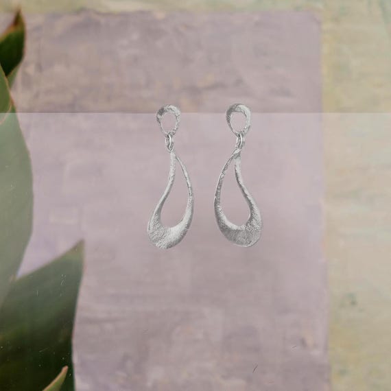 Delicate Gold stud earring, also available in Silver