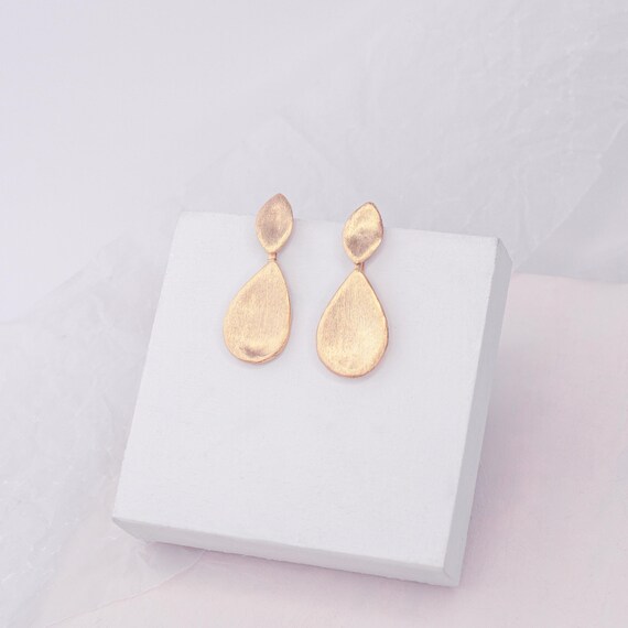 Elegant Gold teardrop stud earrings, also available in Silver