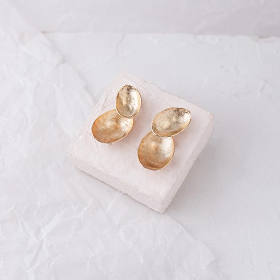 Gold shell stud earrings, also available in Silver and as Clip On