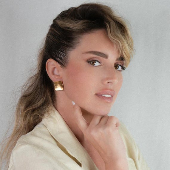 Gold square stud earring, available in Silver and as Clip-On
