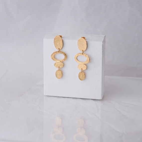 Geometric cascading Gold stud earrings, also available in Clip-On and Silver