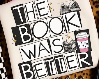 May include: Cream-colored pillow with the text "THE BOOK WAS BETTER" in black and white block letters. The design includes illustrations of an open book and a coffee cup with star accents. The words "Dreamy Boho Artistry" are at the bottom.