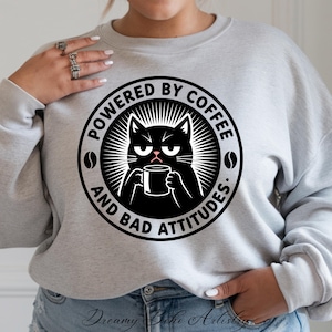 Funny Coffee Cat Shirt Powered by Coffee and Bad Attitudes Grumpy Cat Tee Sublimation Moody Cat Lover Gift Goth Aesthetic Coffee Addict Png