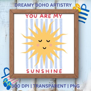 May include: A framed print with a cheerful sun illustration. The sun is yellow with a smiling face, set against a background of blue vertical stripes. The words "YOU ARE MY SUNSHINE" are written in red.