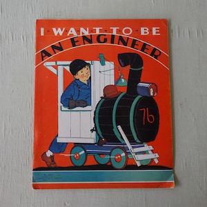 May include: A vintage children's book cover with an orange background. The cover features a boy in a blue jacket and a black hat driving a toy train. The title of the book is "I Want To Be An Engineer".