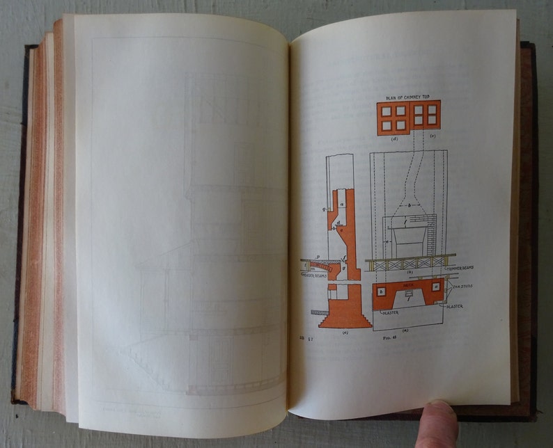 May include: A black and white diagram of a fireplace with a chimney. The diagram shows the different parts of the fireplace, including the hearth, the firebox, the flue, and the chimney. The diagram also includes text labels for each part of the fireplace.
