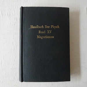 May include: Black book with gold lettering on the spine. The title reads "Handbuch Der Physik Band XV Magnetismus".