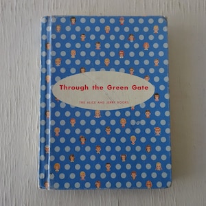 May include: A blue book with white polka dots and the title "Through the Green Gate" with the subtitle "The Alice and Jerry Books".
