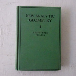 May include: A green hardcover book titled "New Analytic Geometry" by Smith, Gale, and Neeley.