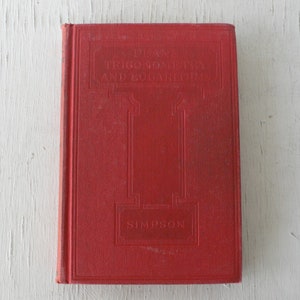 May include: A red hardcover book titled "Plane Trigonometry and Logarithms" by Simpson.