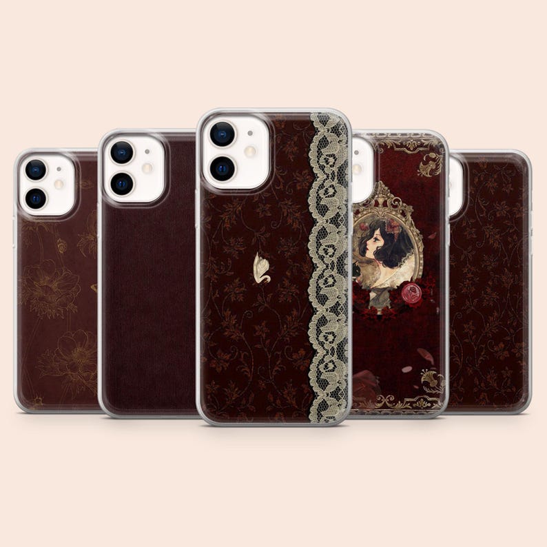 May include: A collection of five phone cases with a dark red and brown color scheme. The cases feature various designs, including floral patterns, a swan, a lace border, and a portrait of a woman in a mirror.