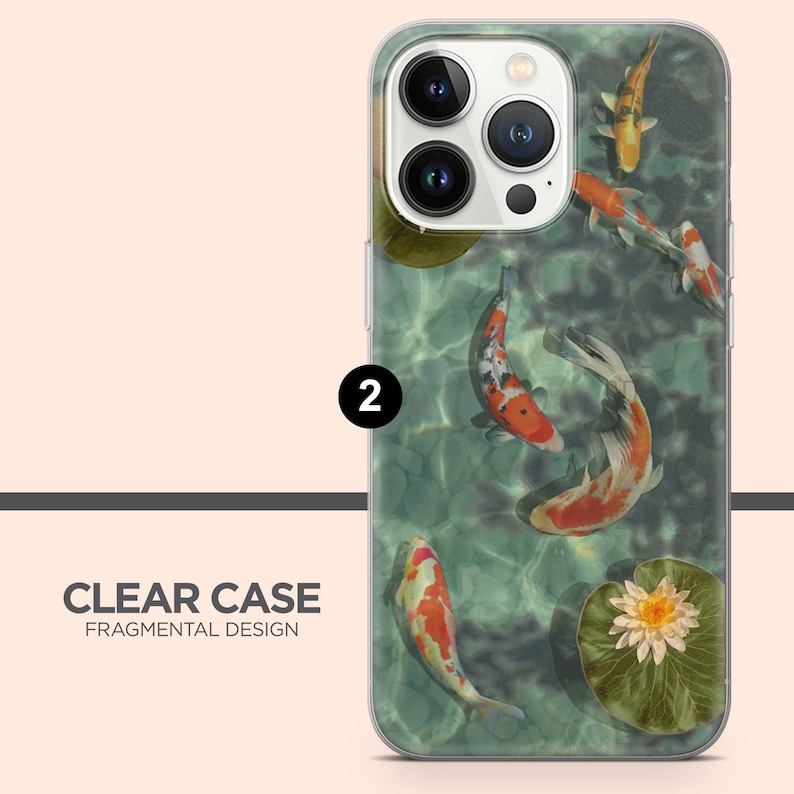 May include: Clear phone case featuring a design of koi fish swimming in a pond. The case has a clear background with a Fragmental Design text at the bottom. The koi fish are orange, white, and black.