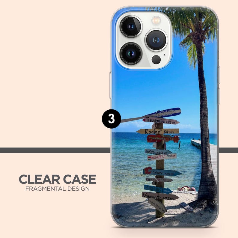May include: Clear phone case featuring a tropical beach scene. The case shows a palm tree, blue sky, and a signpost with destination arrows. The text "CLEAR CASE FRAGMENTAL DESIGN" is printed on the case.