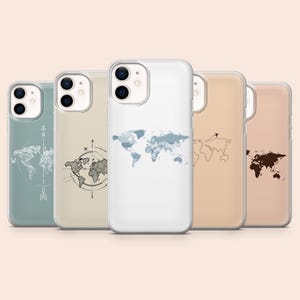 May include: A collection of five phone cases with world map designs. The cases feature various colors, including white, beige, and teal. The map designs vary, with some showing detailed outlines and others with a more abstract style. The cases are made of a clear, glossy material.