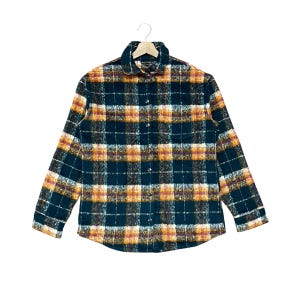 May include: A long-sleeve button-down shirt featuring a dark teal, orange, and white plaid pattern. The shirt has a standard collar, a single chest pocket, and silver-toned metal snap buttons running down the front placket and on the cuffs.