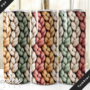 May include: Three stainless steel tumblers with a seamless design of a knitted pattern in shades of beige, green, pink, and orange. The tumblers have a white straw and the words "Seamless Design" and "Tumbler Wraps" are visible.