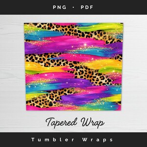 Tapered tumbler wrap template preview featuring seamless rainbow brush strokes over leopard print with sparkling gold glitter details, bold colorful paint stripe design optimized for tapered skinny tumblers, PNG and PDF sublimation wrap format.