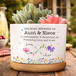 May include: A rustic wooden sign with the text "Welcome to our home" in white lettering. The sign features a distressed finish and a simple, inviting design, perfect for a front porch or entryway.