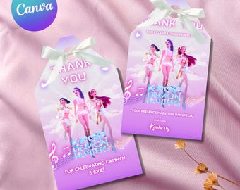 May include: Two lavender gift tags with white ribbon bows. Each tag features a graphic of three women and the text "KPOP DEMON HUNTERS". The tags also include the words "Thank You" and "For Celebrating".