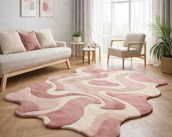Handgetufteter Wollteppich, rosafarbener Teppich mit unregelmäßiger Form, ästhetischer abstrakter Wirbelteppich, dänisches Pastelldekor, süße Wohnheim- und Schlafzimmerbodenkunst