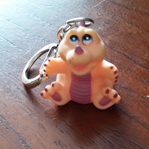 Collectible TV show Dinosaurs Baby Sinclair key chain - Jim Henson and Disney -RARE