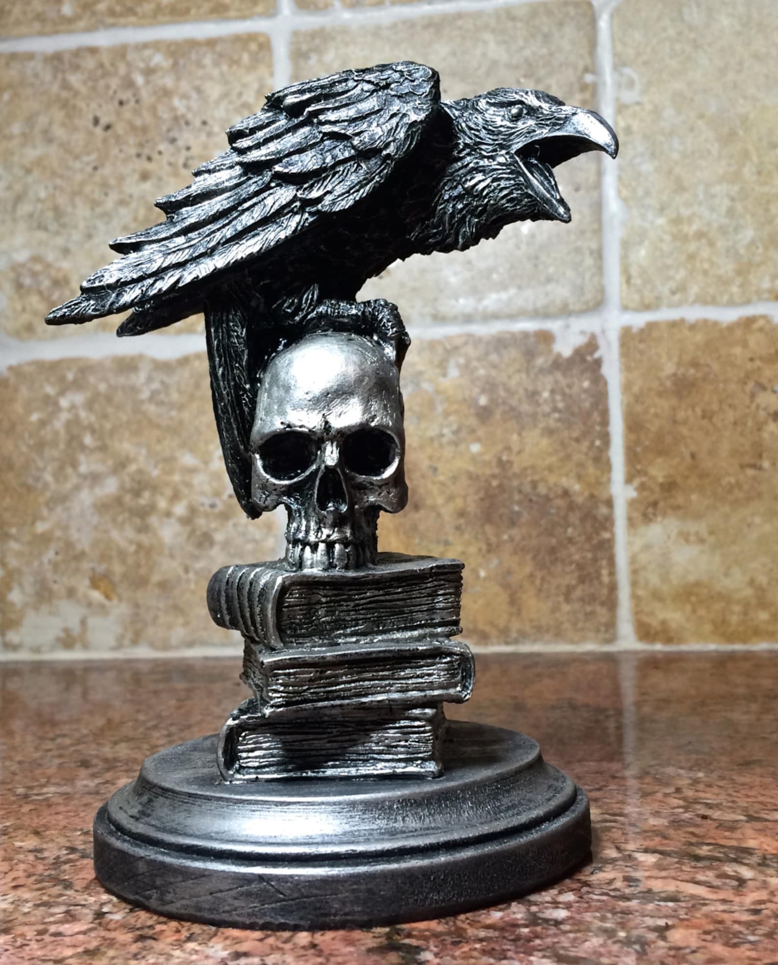 red raven resin statue