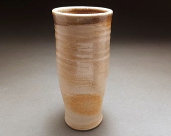 Wood fired orange and gray tumbler with wadding marks