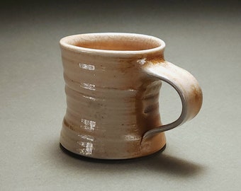 Glossy orange and gray wood fired coffee mug