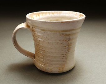 Pale green and white wood fired mug with shiny ash drips