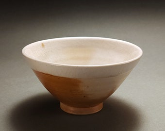 Orange wood fired rice bowl with creamy shino liner glaze