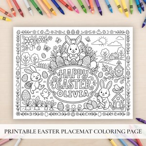 May include: Black and white printable Easter placemat coloring page. Features bunnies, Easter eggs, flowers, and the text "Happy Easter Olivia". Includes a border with Easter-themed illustrations. Crayons are visible in the background.