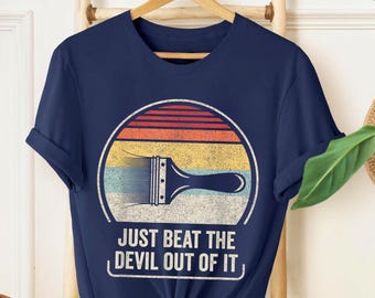 Just Beat The Devil Out Of It Shirt – Retro Artist Tee