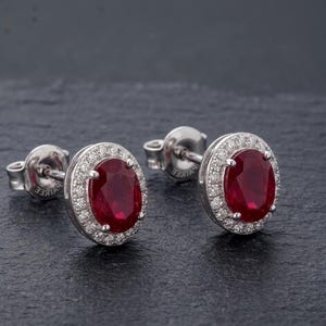 Oval Ruby Halo Stud Earrings | Sterling Silver July Birthstone Jewelry