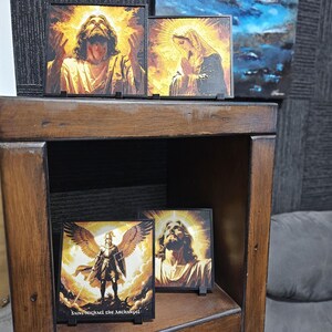 Christian layered wall art featuring Jesus, Mary and Archangels. Handmade in Queensland Australia. catholic layered wall art,3d christian wall art,3d shadow box art,prayer room decor,archangel wall display,mother mary decor,jesus wall decor,holy wall art,church wall feature,spiritual wall art,christianity handmade wall art