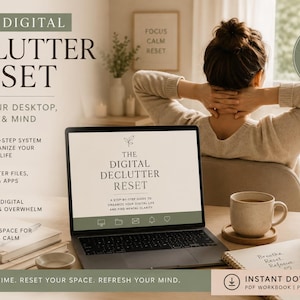 May include: A laptop displays "The Digital Declutter Reset" text, with a woman in the background. The image includes a coffee cup, a candle, and a notebook. The text promotes organizing digital life and finding mental clarity.