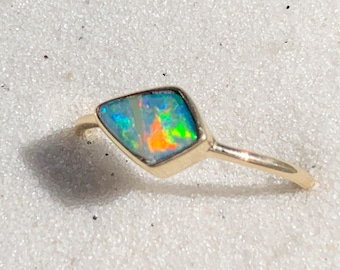 Bright solid Boulder opal and solid 18k gold ring