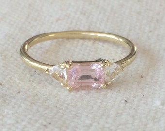 Untreated pink sapphire and phenakite engagement ring in solid 18k gold