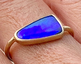 Huge flash blue Boulder opal and solid 22k gold ring