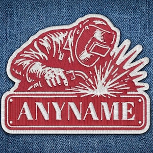 May include: A white ceramic mug with a black handle and the text "But First, Coffee" in a black, bold font. The mug is on a white surface.