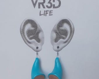 Drop earrings with wood inlay. Crazy looking shape that atracts peoples atention!