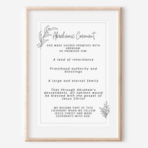 May include: A framed print with the text "Abrahamic Covenant" in elegant script. The text details promises made by God to Abraham, including a land of inheritance, blessings, and a large family. Decorative floral elements frame the text.
