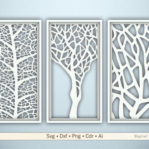 May include: Three white framed wall art panels featuring tree branch designs. The tree branches are cut out, creating a negative space effect. The panels are displayed against a light blue background. Text at the bottom reads "Svg • Dxf • Png • Cdr • Ai Digital files."