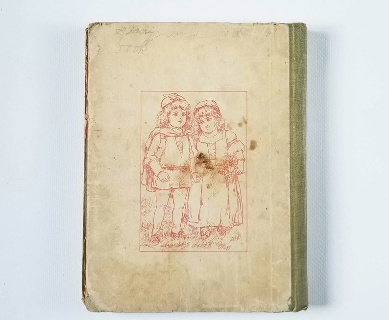 May include: A vintage book cover with a red illustration of two children in old-fashioned clothing. The book cover is cream colored with a green spine.