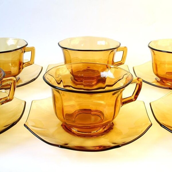 Amber glass teacups, vintage glass cups and saucers.